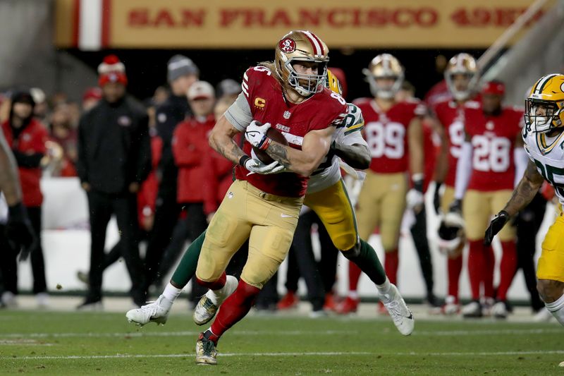 San Francisco 49ers tight end George Kittle (85) runs during an NFL divisional round playoff football game against the Green Bay Packers Saturday, Jan. 20, 2024, in Santa Clara. (AP Photo/Scot Tucker)