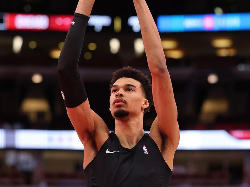 CHICAGO, ILLINOIS - JANUARY 06: Victor Wembanyama #1 of the San Antonio Spurs warms up prior to the game against the Chicago Bulls at the United Center on January 06, 2025 in Chicago, Illinois. NOTE TO USER: User expressly acknowledges and agrees that, by downloading and or using this photograph, User is consenting to the terms and conditions of the Getty Images License Agreement.  (Photo by Michael Reaves/Getty Images)