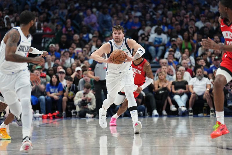 DALLAS, TX - APRIL 7: Luka Doncic #77 of the Dallas Mavericks looks to pass the ball during the game against the Houston Rockets on April 7, 2024 at the American Airlines Center in Dallas, Texas. NOTE TO USER: User expressly acknowledges and agrees that, by downloading and or using this photograph, User is consenting to the terms and conditions of the Getty Images License Agreement. Mandatory Copyright Notice: Copyright 2024 NBAE (Photo by Glenn James/NBAE via Getty Images)