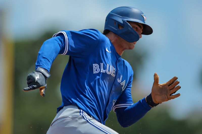 Mar 15, 2025; Jupiter, Florida, USA; Toronto Blue Jays center fielder Joey Loperfido (10) runs past third base against the St. Louis Cardinals during the second inning at Roger Dean Chevrolet Stadium. Mandatory Credit: Sam Navarro-Imagn Images
