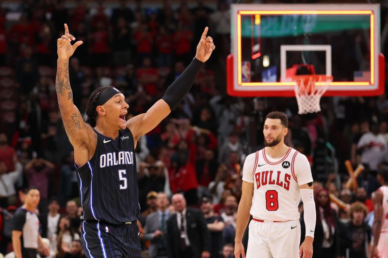 CHICAGO, ILLINOIS - OCTOBER 30: Paolo Banchero #5 of the Orlando Magic reacts after making a three pointer after time expired against the Chicago Bulls during the second half at the United Center on October 30, 2024 in Chicago, Illinois. The shot was reviewed and ruled 'no basket'.NOTE TO USER: User expressly acknowledges and agrees that, by downloading and or using this photograph, User is consenting to the terms and conditions of the Getty Images License Agreement.  (Photo by Michael Reaves/Getty Images)