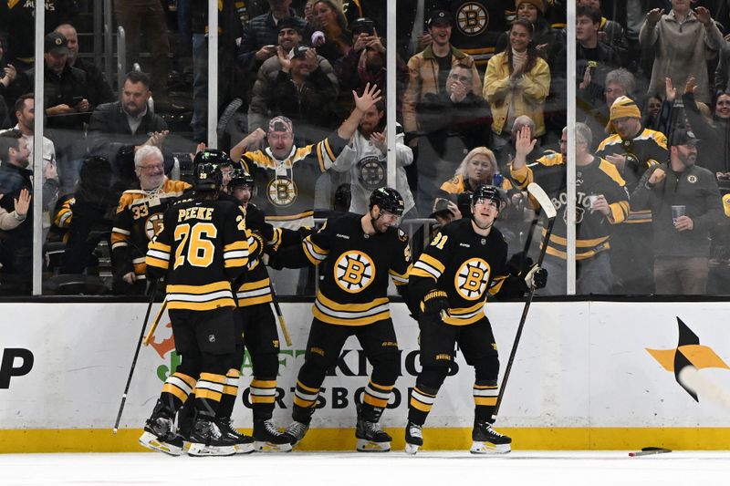 Nov 6, 2025; Boston, Massachusetts, USA; Boston Bruins center Sean Kuraly (52) celebrates with teammates after scoring a goal against the Ottawa Senators during the second period at the TD Garden. Mandatory Credit: Brian Fluharty-Imagn Images