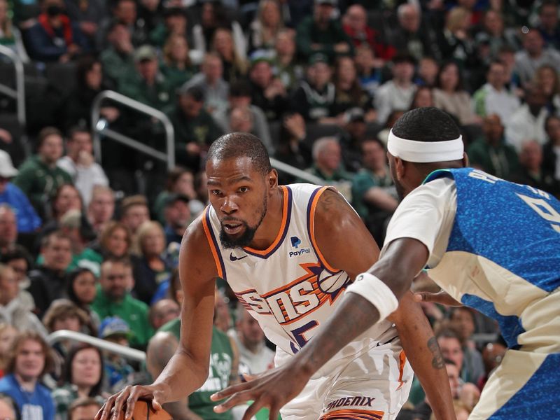 MILWAUKEE, WI - MARCH 17: Kevin Durant #35 of the Phoenix Suns looks on during the game against the Milwaukee Bucks on March 17, 2024 at the Fiserv Forum Center in Milwaukee, Wisconsin. NOTE TO USER: User expressly acknowledges and agrees that, by downloading and or using this Photograph, user is consenting to the terms and conditions of the Getty Images License Agreement. Mandatory Copyright Notice: Copyright 2024 NBAE (Photo by Gary Dineen/NBAE via Getty Images).