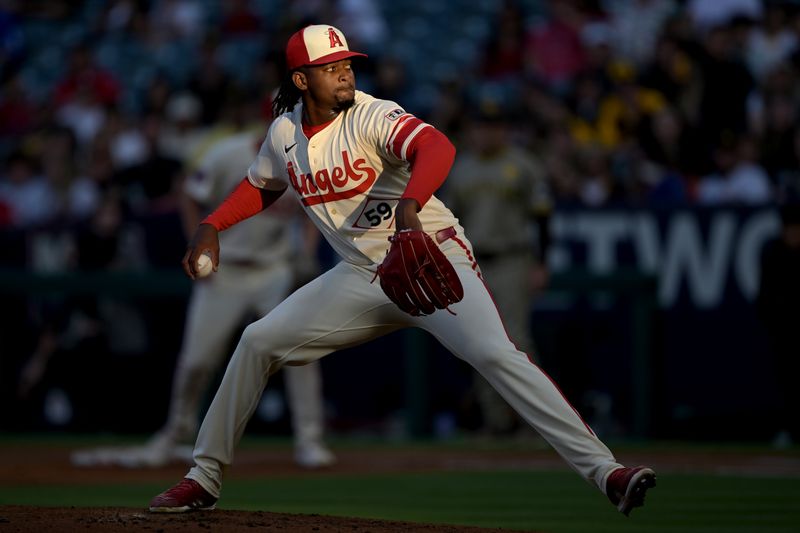 Jun 5, 2024; Anaheim, California, USA;  Los Angeles Angels starting pitcher Jose Soriano (59) delivers to the plate in the third inning against the San Diego Padres at Angel Stadium. Mandatory Credit: Jayne Kamin-Oncea-USA TODAY Sports