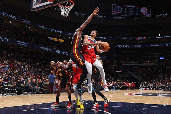 WASHINGTON, DC -? DECEMBER 31: Jordan Poole #13 of the Washington Wizards shoots the ball during the game against the Atlanta Hawks on December 31, 2023 at Capital One Arena in Washington, DC. NOTE TO USER: User expressly acknowledges and agrees that, by downloading and or using this Photograph, user is consenting to the terms and conditions of the Getty Images License Agreement. Mandatory Copyright Notice: Copyright 2023 NBAE (Photo by Stephen Gosling/NBAE via Getty Images)