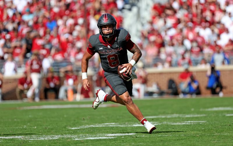 Oct 15, 2022; Norman, Oklahoma, USA;  Oklahoma Sooners quarterback Dillon Gabriel (8) runs with the ball during the second half against the Kansas Jayhawks at Gaylord Family-Oklahoma Memorial Stadium. Mandatory Credit: Kevin Jairaj-USA TODAY Sports