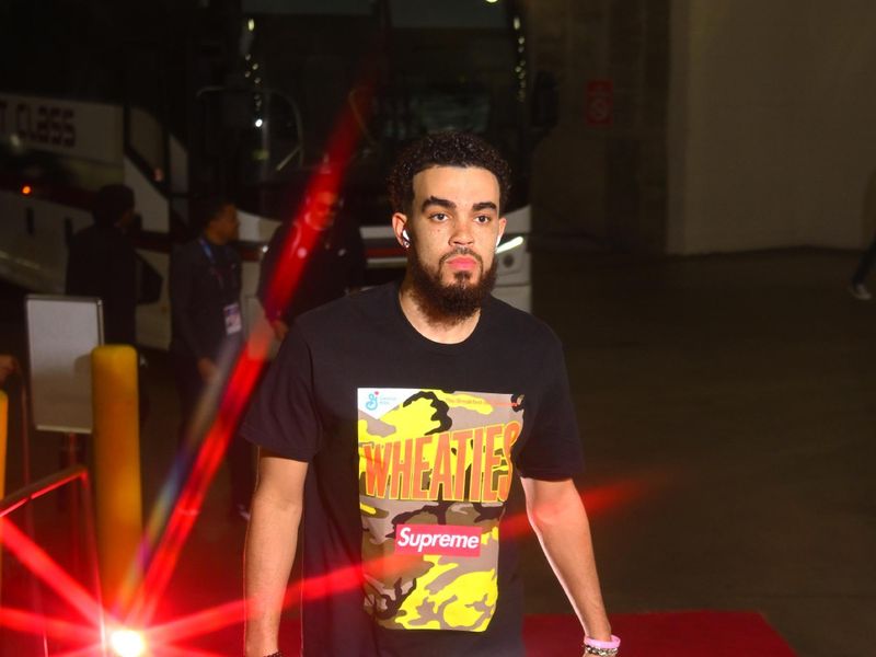 HOUSTON, TX - MARCH 14:  Tyus Jones #5 of the Washington Wizards arrives to the arena before the game against the Houston Rockets on March 14, 2024 at the Toyota Center in Houston, Texas. NOTE TO USER: User expressly acknowledges and agrees that, by downloading and or using this photograph, User is consenting to the terms and conditions of the Getty Images License Agreement. Mandatory Copyright Notice: Copyright 2024 NBAE (Photo by Logan Riely/NBAE via Getty Images)