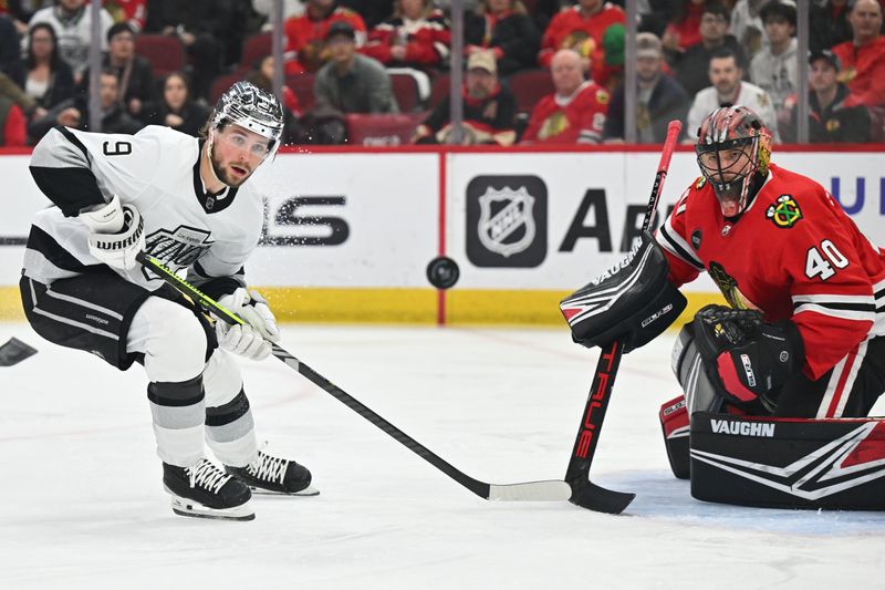 Mar 15, 2024; Chicago, Illinois, USA; Los Angeles Kings forward Adrian Kempe (9) chases after a loose puck in the first period as Chicago Blackhawks goaltender Arvid Soderblom (40) defends the net at United Center. Mandatory Credit: Jamie Sabau-USA TODAY Sports