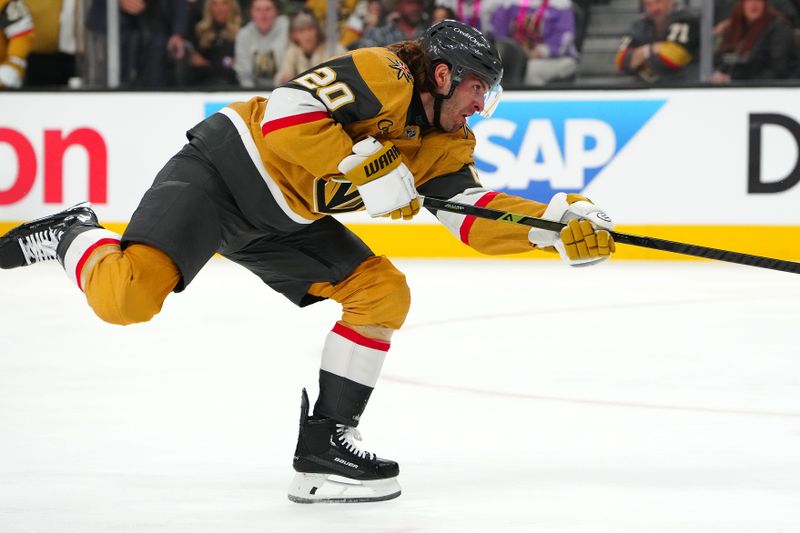 Apr 20, 2025; Las Vegas, Nevada, USA; Vegas Golden Knights left wing Brandon Saad (20) shoots against the Minnesota Wild during the second period of game one of the first round of the 2025 Stanley Cup Playoffs at T-Mobile Arena. Mandatory Credit: Stephen R. Sylvanie-Imagn Images