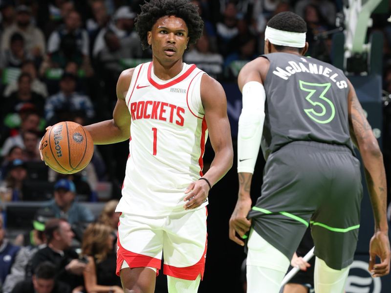 MINNEAPOLIS, MN -  NOVEMBER 26: Amen Thompson #1 of the Houston Rockets dribbles the ball during the game against the Minnesota Timberwolves during the Emirates NBA Cup game on November 26, 2024 at Target Center in Minneapolis, Minnesota. NOTE TO USER: User expressly acknowledges and agrees that, by downloading and or using this Photograph, user is consenting to the terms and conditions of the Getty Images License Agreement. Mandatory Copyright Notice: Copyright 2024 NBAE (Photo by David Sherman/NBAE via Getty Images)