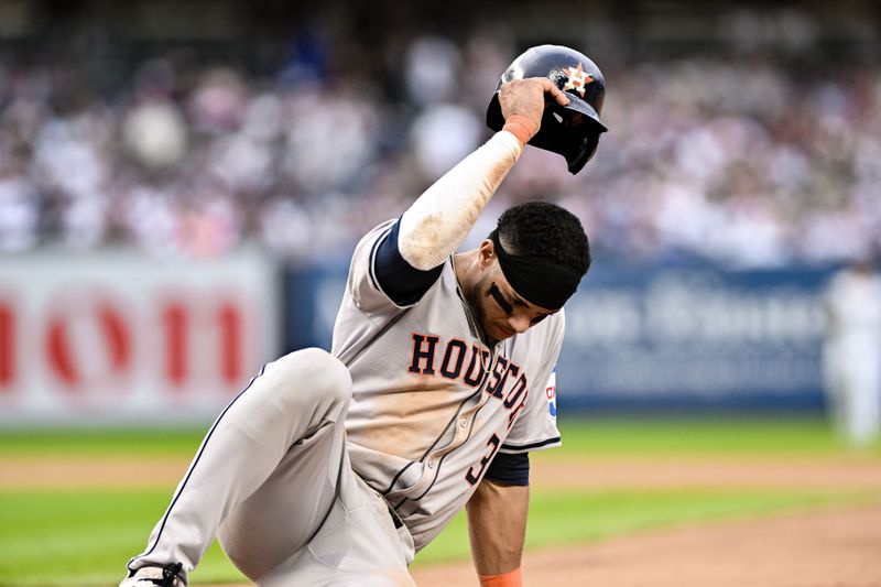 May 9, 2024; Bronx, New York, USA; Houston Astros shortstop Jeremy Pena (3) reacts after being caught in a double play during the fifth inning against the New York Yankees at Yankee Stadium. Mandatory Credit: John Jones-USA TODAY Sports