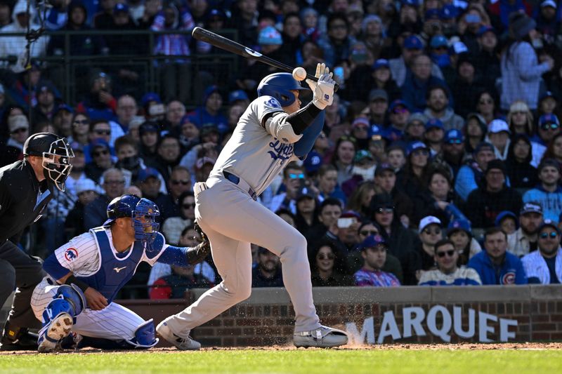 Apr 6, 2024; Chicago, Illinois, USA;  Los Angeles Dodgers two-way player Shohei Ohtani (17) bats during the third inning against the Chicago Cubs at Wrigley Field. Mandatory Credit: Matt Marton-USA TODAY Sports