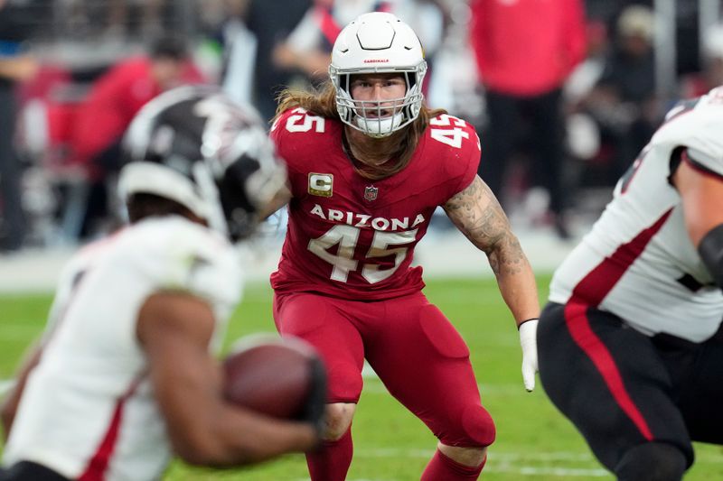 Arizona Cardinals linebacker Dennis Gardeck runs to the ball during the second half of an NFL football game against the Atlanta Falcons Sunday, Nov. 12, 2023, in Glendale, Ariz. The Cardinals won 25-23. (AP Photo/Ross D. Franklin)