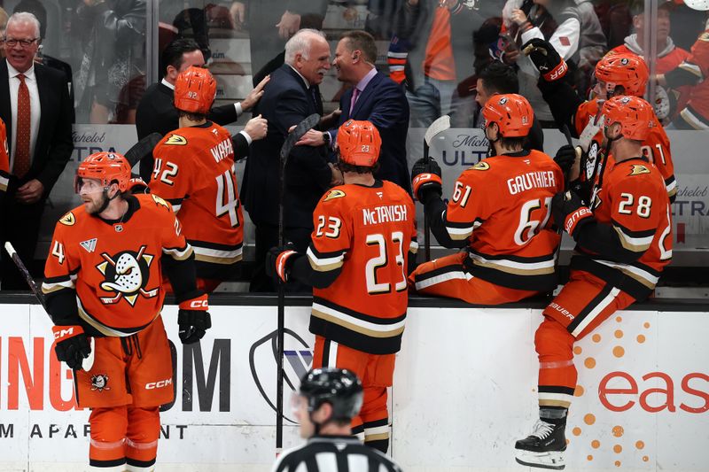 Feb 25, 2026; Anaheim, California, USA; Anaheim Ducks head coach Joel Quenneville (back row, middle) celebrates with his coaching staff and players after winning his 1,000th career coaching victory with a 6-5 win over the Edmonton Oilers at Honda Center. Mandatory Credit: Kiyoshi Mio-Imagn Images Feb 25, 2026; Anaheim, California, USA; Anaheim Ducks head coach Joel Quenneville (back row, middle) celebrates with his coaching staff and players after winning his 1,000th career coaching victory with a 6-5 win over the Edmonton Oilers at Honda Center. Mandatory Credit: Kiyoshi Mio-Imagn Images
