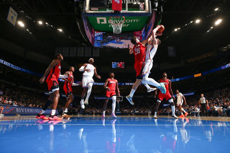 OKLAHOMA CITY, OK - OCTOBER 9: Alperen Sengun #28 of the Houston Rockets goes up for a block during the game against the Oklahoma City Thunder during a NBA pre season game on October 9, 2024 at Paycom Center in Oklahoma City, Oklahoma. NOTE TO USER: User expressly acknowledges and agrees that, by downloading and or using this photograph, User is consenting to the terms and conditions of the Getty Images License Agreement. Mandatory Copyright Notice: Copyright 2024 NBAE (Photo by Zach Beeker/NBAE via Getty Images)