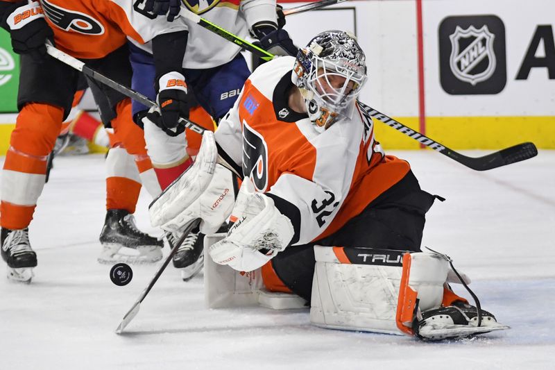 Mar 24, 2024; Philadelphia, Pennsylvania, USA; Philadelphia Flyers goaltender Felix Sandstrom (32) makes a save against the Florida Panthers during the second period at Wells Fargo Center. Mandatory Credit: Eric Hartline-USA TODAY Sports