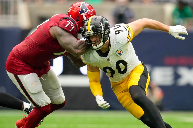 Pittsburgh Steelers linebacker T.J. Watt (90) is blocked by Houston Texans offensive tackle George Fant (77) during the first half of an NFL football game, Sunday, Oct. 1, 2023, in Houston. (AP Photo/Eric Christian Smith)