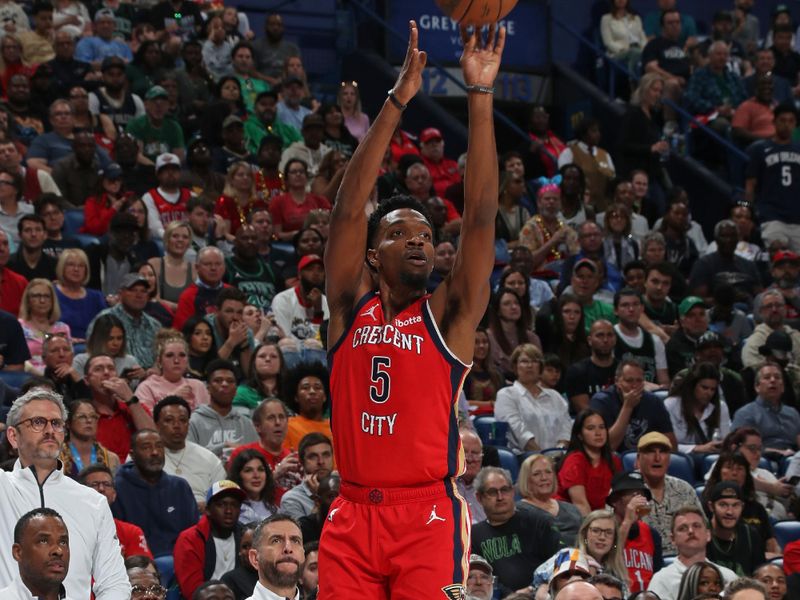 NEW ORLEANS, LA - MARCH 30: Herb Jones #5 of the New Orleans Pelicans three point basket during the game against the Boston Celtics on March 30, 2024 at the Smoothie King Center in New Orleans, Louisiana. NOTE TO USER: User expressly acknowledges and agrees that, by downloading and or using this Photograph, user is consenting to the terms and conditions of the Getty Images License Agreement. Mandatory Copyright Notice: Copyright 2024 NBAE (Photo by Layne Murdoch Jr./NBAE via Getty Images)