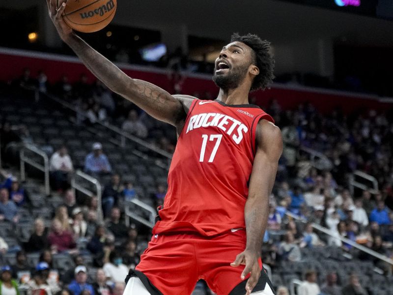 DETROIT, MICHIGAN - NOVEMBER 10: Tari Eason #17 of the Houston Rockets shoots against the Detroit Pistons during the third quarter at Little Caesars Arena on November 10, 2024 in Detroit, Michigan. NOTE TO USER: User expressly acknowledges and agrees that, by downloading and or using this photograph, User is consenting to the terms and conditions of the Getty Images License Agreement. (Photo by Nic Antaya/Getty Images)