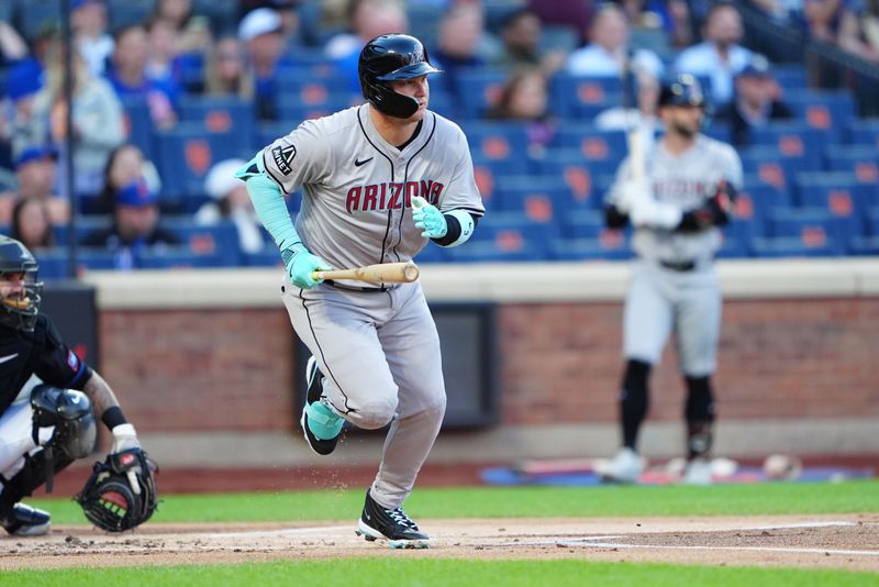 May 31, 2024; New York City, New York, USA; Arizona Diamondbacks designated hitter Joc Pederson (3) runs out an RBI single against the New York Mets during the first inning at Citi Field. Mandatory Credit: Gregory Fisher-USA TODAY Sports