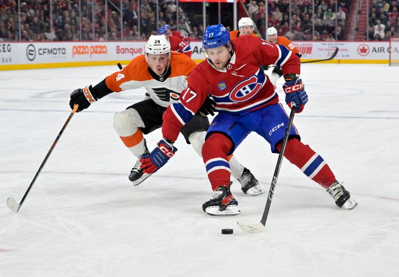 Apr 9, 2024; Montreal, Quebec, CAN; Montreal Canadiens forward Josh Anderson (17) plays the puck and Philadelphia Flyers defenseman Nick Seeler (24) defends during the second period at the Bell Centre. Mandatory Credit: Eric Bolte-USA TODAY Sports