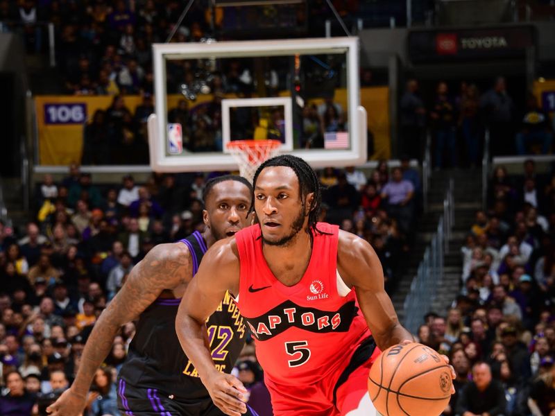 LOS ANGELES, CA - JANUARY 9: Precious Achiuwa #5 of the Toronto Raptors dribbles the ball during the game against the Los Angeles Lakers on January 9, 2024 at Crypto.Com Arena in Los Angeles, California. NOTE TO USER: User expressly acknowledges and agrees that, by downloading and/or using this Photograph, user is consenting to the terms and conditions of the Getty Images License Agreement. Mandatory Copyright Notice: Copyright 2024 NBAE (Photo by Adam Pantozzi/NBAE via Getty Images)