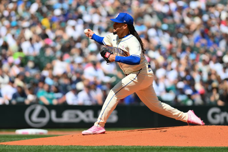 May 12, 2024; Seattle, Washington, USA; Seattle Mariners starting pitcher Luis Castillo (58) pitches to the Oakland Athletics during the first inning at T-Mobile Park. Mandatory Credit: Steven Bisig-USA TODAY Sports