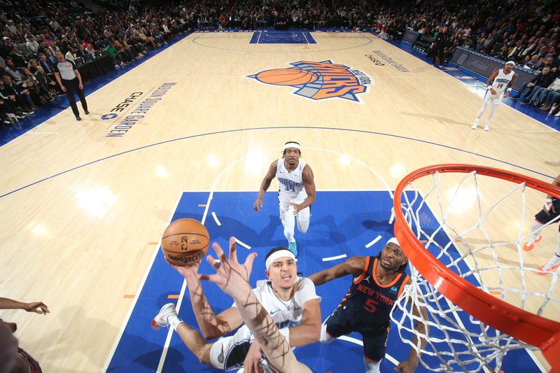 NEW YORK, NY - MARCH 8: Anthony Black #0 of the Orlando Magic drives to the basket during the game against the New York Knicks on March 8, 2024 at Madison Square Garden in New York City, New York.  NOTE TO USER: User expressly acknowledges and agrees that, by downloading and or using this photograph, User is consenting to the terms and conditions of the Getty Images License Agreement. Mandatory Copyright Notice: Copyright 2024 NBAE  (Photo by Nathaniel S. Butler/NBAE via Getty Images)