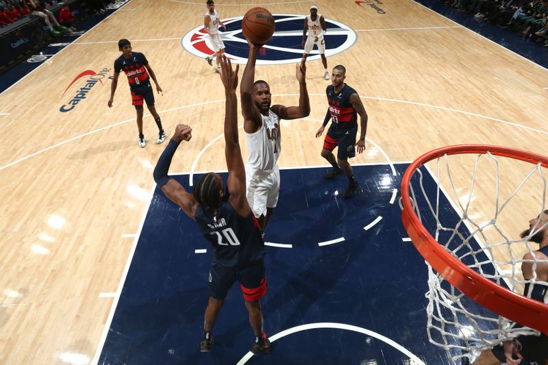 WASHINGTON, DC -? OCTOBER 26:  Evan Mobley #4 of the Cleveland Cavaliers shoots the ball during the game against the Washington Wizards on October 26, 2024 at Capital One Arena in Washington, DC. NOTE TO USER: User expressly acknowledges and agrees that, by downloading and or using this Photograph, user is consenting to the terms and conditions of the Getty Images License Agreement. Mandatory Copyright Notice: Copyright 2024 NBAE (Photo by Kenny Giarla/NBAE via Getty Images)