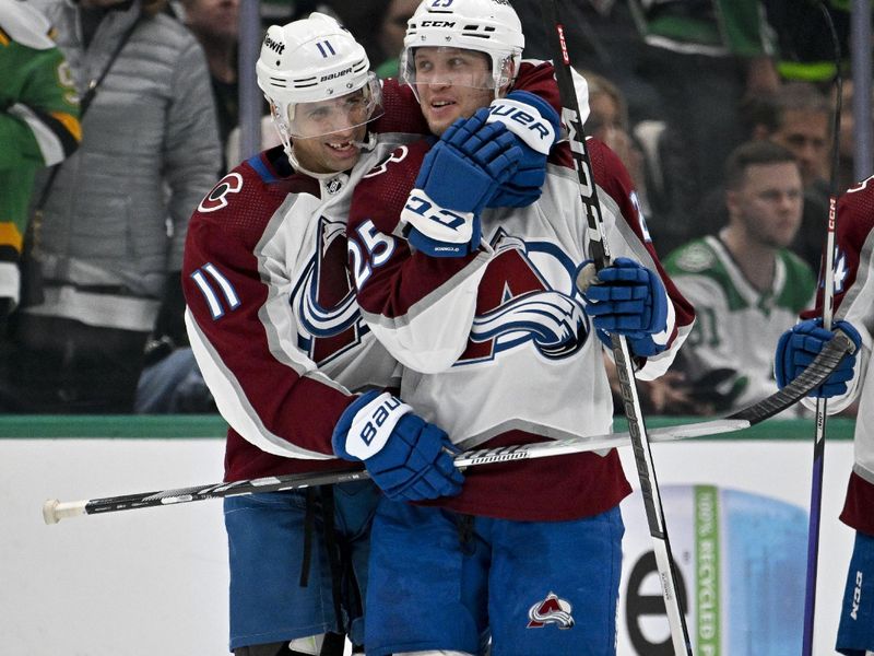 Jan 4, 2024; Dallas, Texas, USA; Colorado Avalanche center Andrew Cogliano (11) and right wing Logan O'Connor (25) celebrates the game winning goal scored by center Nathan MacKinnon (29) during the overtime period against the Dallas Stars at the American Airlines Center. Mandatory Credit: Jerome Miron-USA TODAY Sports