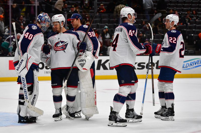 Feb 21, 2024; Anaheim, California, USA; Columbus Blue Jackets celebrate the victory against the Anaheim Ducks at Honda Center. Mandatory Credit: Gary A. Vasquez-USA TODAY Sports