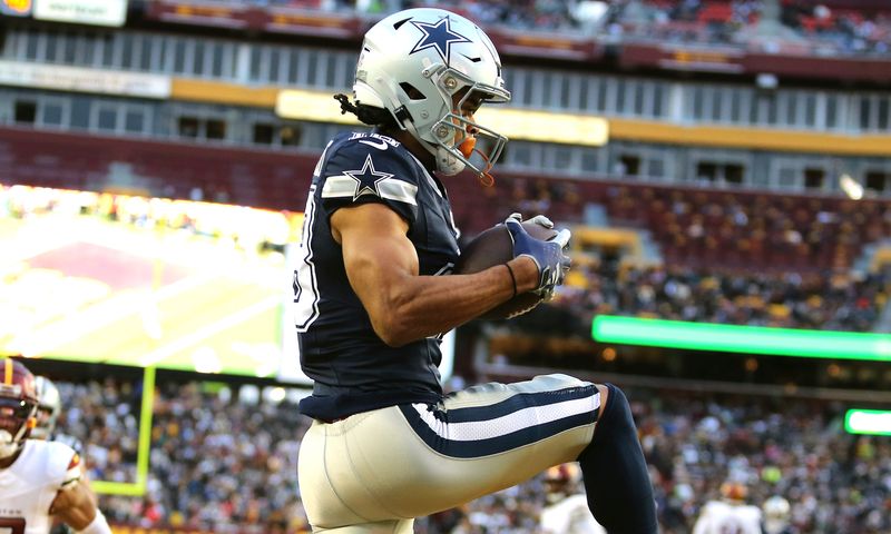 Dallas Cowboys wide receiver Jalen Tolbert (18) makes a catch for a touchdown during an NFL football game against the Washington Commanders, Sunday, January 7, 2024 in Landover, Md. (AP Photo/Daniel Kucin Jr.)