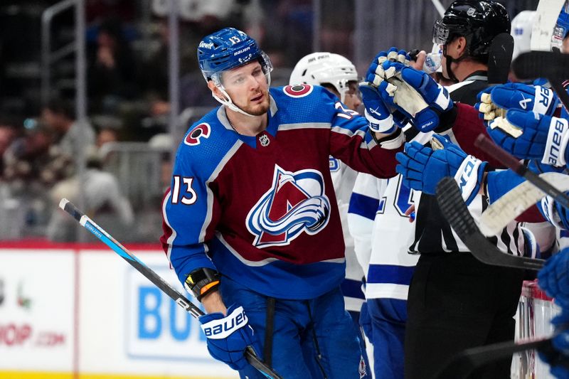 Nov 27, 2023; Denver, Colorado, USA; Colorado Avalanche right wing Valeri Nichushkin (13) celebrates his goal in the third period against the Tampa Bay Lightning at Ball Arena. Mandatory Credit: Ron Chenoy-USA TODAY Sports