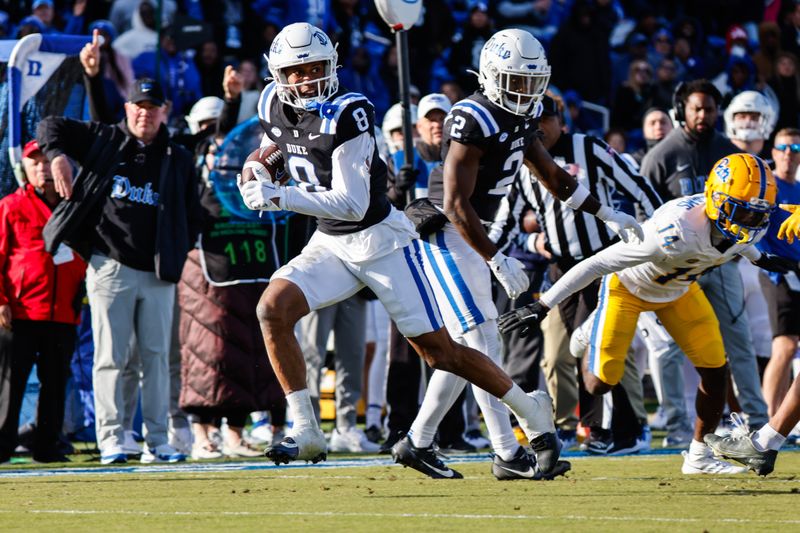 Nov 25, 2023; Durham, North Carolina, USA; Duke Blue Devils wide receiver Jordan Moore (8) runs with the ball towards the end zone during the second half of the game against Pittsburgh Panthers at Wallace Wade Stadium.  Mandatory Credit: Jaylynn Nash-USA TODAY Sports