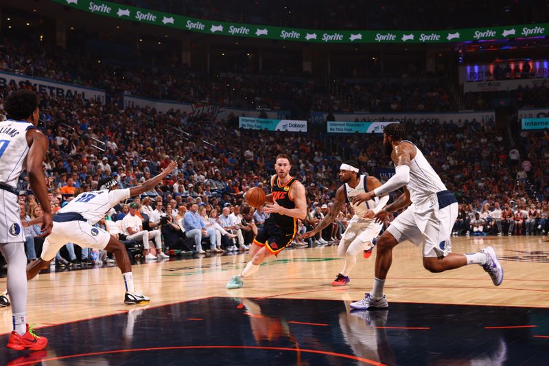 OKLAHOMA CITY, OK - APRIL 14: Gordon Hayward #33 of the Oklahoma City Thunder dribbles the ball during the game against the Dallas Mavericks  on April 14, 2024 at Paycom Arena in Oklahoma City, Oklahoma. NOTE TO USER: User expressly acknowledges and agrees that, by downloading and or using this photograph, User is consenting to the terms and conditions of the Getty Images License Agreement. Mandatory Copyright Notice: Copyright 2024 NBAE (Photo by Zach Beeker/NBAE via Getty Images)