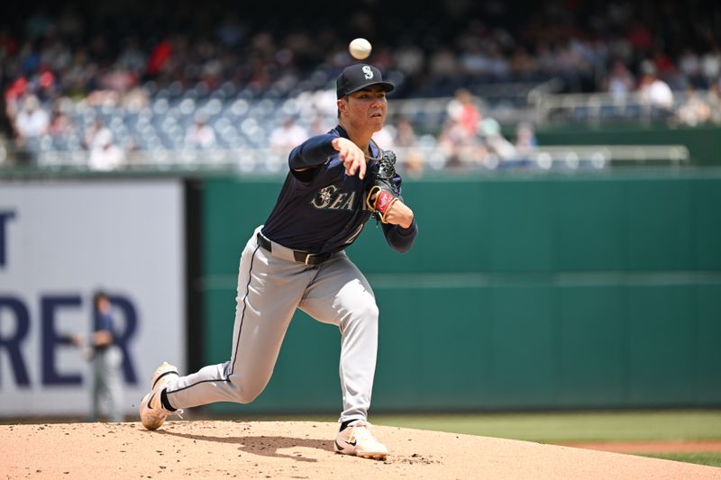 May 26, 2024; Washington, District of Columbia, USA; Seattle Mariners starting pitcher Bryan Woo (22) throws a pitch against the Washington Nationals during the first inning at Nationals Park. Mandatory Credit: Rafael Suanes-USA TODAY Sports