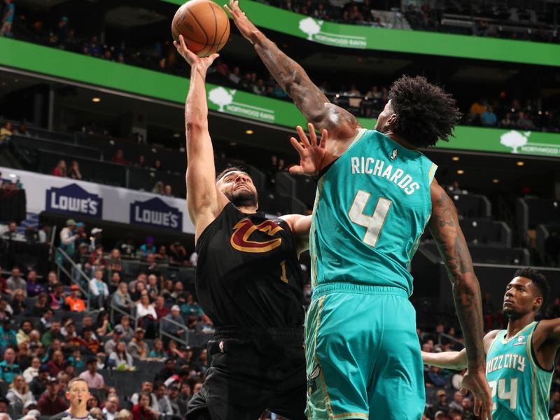 CHARLOTTE, NC - MARCH 27: Max Strus #1 of the Cleveland Cavaliers goes to the basket during the game on March 27, 2024 at Spectrum Center in Charlotte, North Carolina. NOTE TO USER: User expressly acknowledges and agrees that, by downloading and or using this photograph, User is consenting to the terms and conditions of the Getty Images License Agreement. Mandatory Copyright Notice: Copyright 2024 NBAE (Photo by Kent Smith/NBAE via Getty Images)