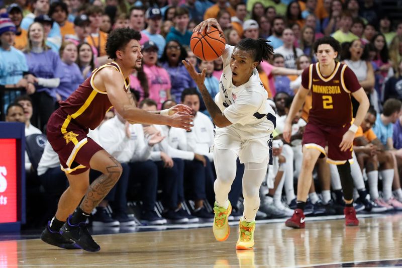 Jan 27, 2024; University Park, Pennsylvania, USA; Penn State Nittany Lions guard Nick Kern Jr (3) steals the ball from Minnesota Golden Gophers guard Braeden Carrington (4) during the first half at Bryce Jordan Center. Minnesota defeated Penn State 83-74. Mandatory Credit: Matthew O'Haren-USA TODAY Sports