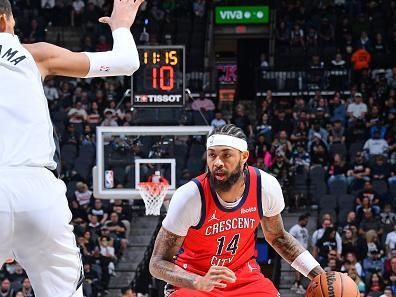 SAN ANTONIO, TX - DECEMBER 17: Brandon Ingram #14 of the New Orleans Pelicans dribbles the ball during the game against the San Antonio Spurs on December 17, 2023 at the Frost Bank Center in San Antonio, Texas. NOTE TO USER: User expressly acknowledges and agrees that, by downloading and or using this photograph, user is consenting to the terms and conditions of the Getty Images License Agreement. Mandatory Copyright Notice: Copyright 2023 NBAE (Photos by Michael Gonzales/NBAE via Getty Images)