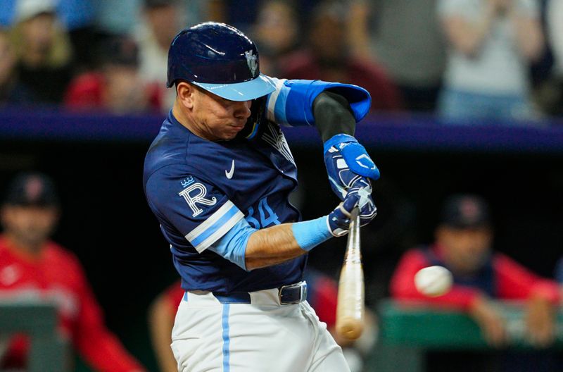 May 9, 2025; Kansas City, Missouri, USA; Kansas City Royals catcher Freddy Fermin (34) hits a walk-off single during the 12th inning against the Boston Red Sox at Kauffman Stadium. Mandatory Credit: Jay Biggerstaff-Imagn Images