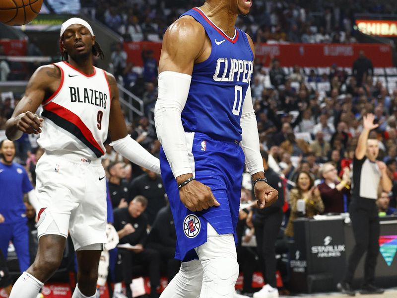 LOS ANGELES, CALIFORNIA - OCTOBER 25:  Russell Westbrook #0 of the LA Clippers reacts against the Portland Trail Blazers in the first half at Crypto.com Arena on October 25, 2023 in Los Angeles, California.  NOTE TO USER: User expressly acknowledges and agrees that, by downloading and/or using this photograph, user is consenting to the terms and conditions of the Getty Images License Agreement. (Photo by Ronald Martinez/Getty Images)