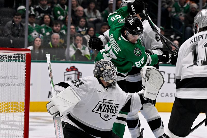 Dec 15, 2025; Dallas, Texas, USA; Dallas Stars center Mavrik Bourque (22) attempts to redirect the puck past Los Angeles Kings goaltender Anton Forsberg (31) during the second period at the American Airlines Center. Mandatory Credit: Jerome Miron-Imagn Images