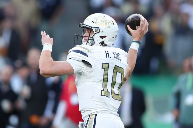 Aug 24, 2024; Dublin, IRL; Georgia Tech quarterback Haynes King passes the ball against Florida State at Aviva Stadium. Mandatory Credit: Tom Maher/INPHO via USA TODAY Sports