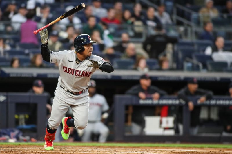 May 2, 2023; Bronx, New York, USA;  Cleveland Guardians third baseman Jose Ramirez (11) hits a single in the third inning against the New York Yankees at Yankee Stadium. Mandatory Credit: Wendell Cruz-USA TODAY Sports