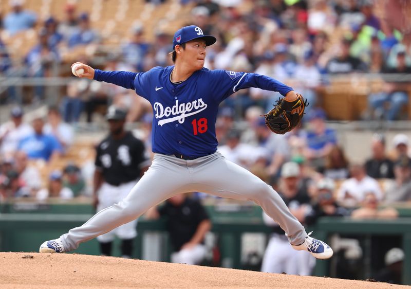 Mar 6, 2024; Phoenix, Arizona, USA; Los Angeles Dodgers pitcher Yoshinobu Yamamoto against the Chicago White Sox during a spring training baseball game at Camelback Ranch-Glendale. Mandatory Credit: Mark J. Rebilas-USA TODAY Sports