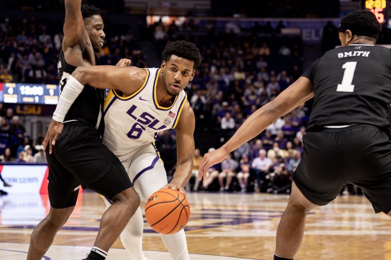 Feb 24, 2024; Baton Rouge, Louisiana, USA; LSU Tigers guard Jordan Wright (6) dribbles against the Mississippi State Bulldogs Pete Maravich Assembly Center. Mandatory Credit: Stephen Lew-USA TODAY Sports