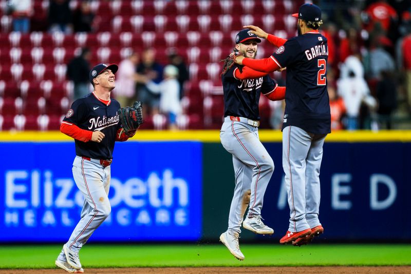 May 3, 2025; Cincinnati, Ohio, USA; Washington Nationals outfielder Dylan Crews (3) reacts with second baseman Luis Garcia Jr. (2) after the victory over the Cincinnati Reds at Great American Ball Park. Mandatory Credit: Katie Stratman-Imagn Images