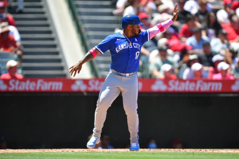 May 12, 2024; Anaheim, California, USA; Kansas City Royals designated hitter Nelson Velazquez (17) scores a  run against the Los Angeles Angels during the fourth inningat Angel Stadium. Mandatory Credit: Gary A. Vasquez-USA TODAY Sports