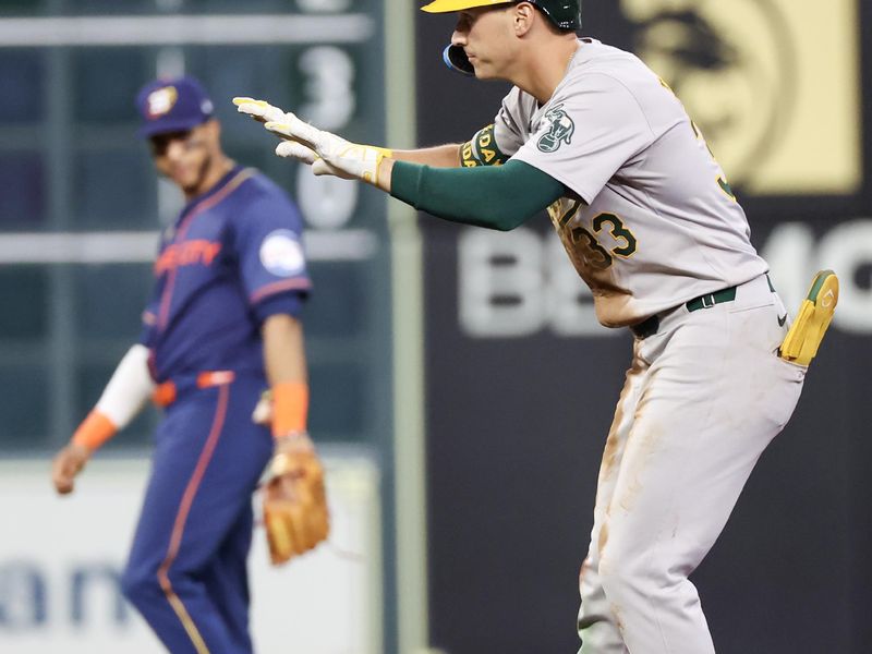 May 13, 2024; Houston, Texas, USA; Oakland Athletics center fielder JJ Bleday (33) reacts to his double against the  Houston Astros in the fifth inning at Minute Maid Park. Mandatory Credit: Thomas Shea-USA TODAY Sports