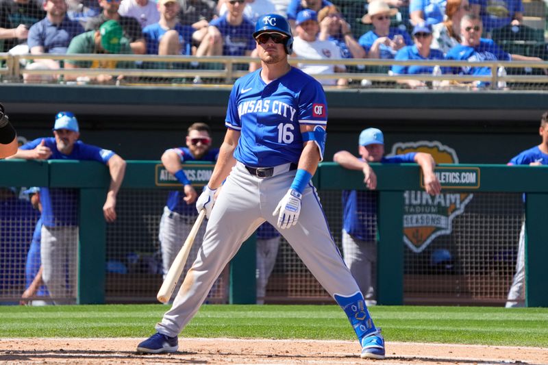 Mar 10, 2024; Mesa, Arizona, USA; Kansas City Royals right fielder Hunter Renfroe (16) hits against the Oakland Athletics in the third inning at Hohokam Stadium. Mandatory Credit: Rick Scuteri-USA TODAY Sports